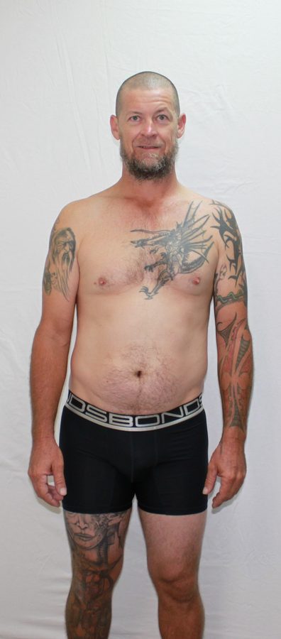 Before photo of a client who trained entirely at home